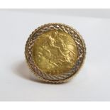 A 1901 half sovereign in a 9 carat gold ring mount, size V, 13 g gross