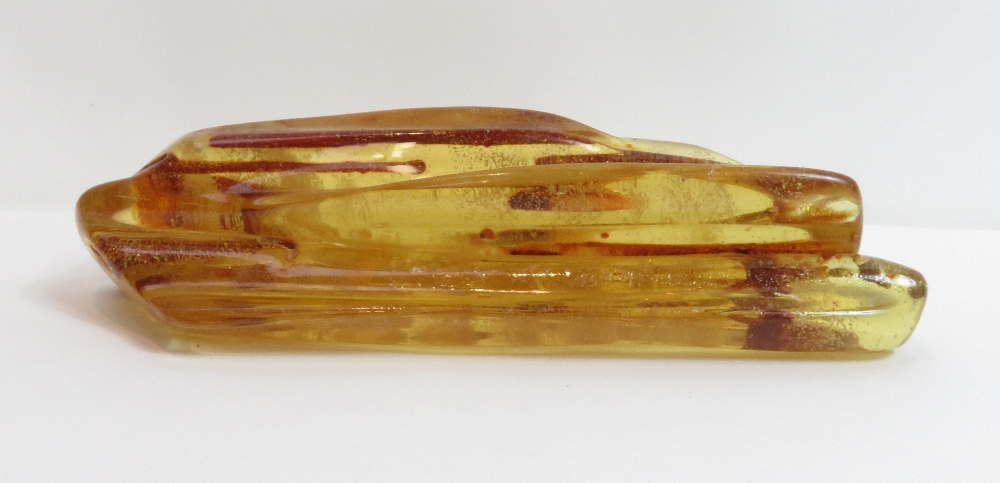 A large piece of raw amber, approximately 20 cm long, 321 g gross