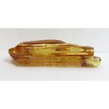 A large piece of raw amber, approximately 20 cm long, 321 g gross