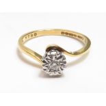 A single stone diamond 18 carat gold ring, illusion set, finger size O, 2.5 g gross