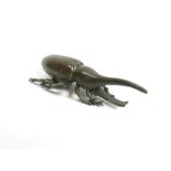A Japanese bronze model of a beetle, 8cm long
