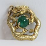 A gold dragon, clutching an emerald bead 'flaming pearl', stamped '14' and 'JS' to the jump ring,