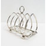 A late Victorian silver toast rack, by Harrison Brothers and Howson, Sheffield 1898, with five
