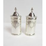 A pair of silver Georgian style peppers, by Elkington & Co, Birmingham 1968, 8.3 cm high, 62 g (2