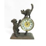 A 20th century spelter clock, modelled with a cat and a dog