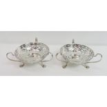A pair of silver bon bon dishes, by Sydney & Co, Birmingham 1910, the circular pierced baskets