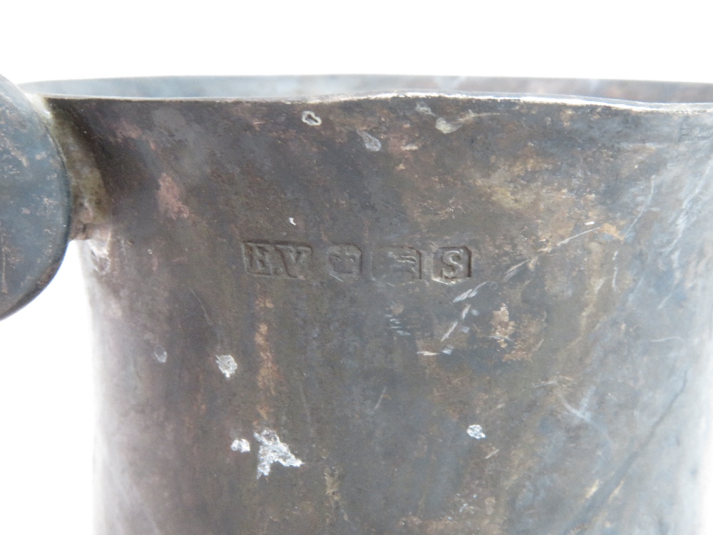 A silver mug, by Edward Viner, Sheffield 1960, of baluster form with leaf capped scroll handle, - Image 3 of 4