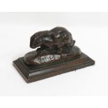 A 20th century bronze model of a hare, signed “BARYE”, standing on rectangular base, 9cm long