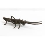 A Japanese bronze model of a grasshopper, 12cm long