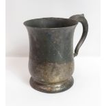 A silver mug, by Edward Viner, Sheffield 1960, of baluster form with leaf capped scroll handle,