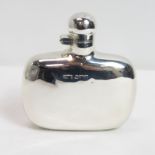 A silver hip flask, by James Dixon & Sons, Sheffield 1915, of plain form with bayonet captive top,