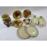 A collection of Clarice Cliff dinner ware to include six various plates, Crocus pattern bowl, two