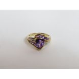 A triangular cut amethyst and diamond 9 carat gold dress ring, finger size N, 3 g gross