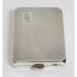 A silver book of matches case, with engine turned decoration and monogrammed, 38 g (1.2 troy ozs)