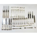 An eight place setting of Mappin & Webb electroplated flatware, includes two serving spoons, 74