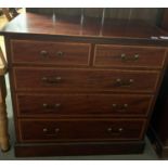 A Victorian inlaid mahogany chest of three long and two short drawers, 104cm high, 107cm long,