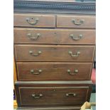 A late 19th/early 20th century mahogany chest on chest of two short and four long graduated drawers,