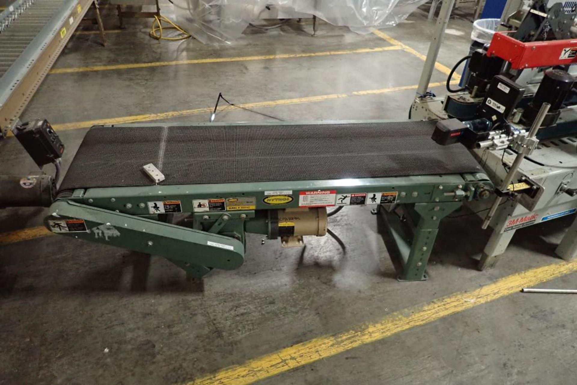 Hytrol powered belt conveyor