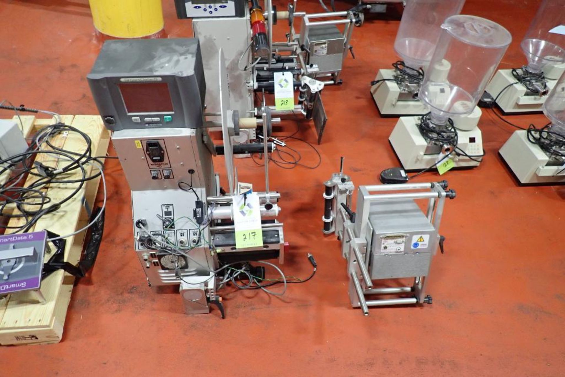 Quadrel labeling head