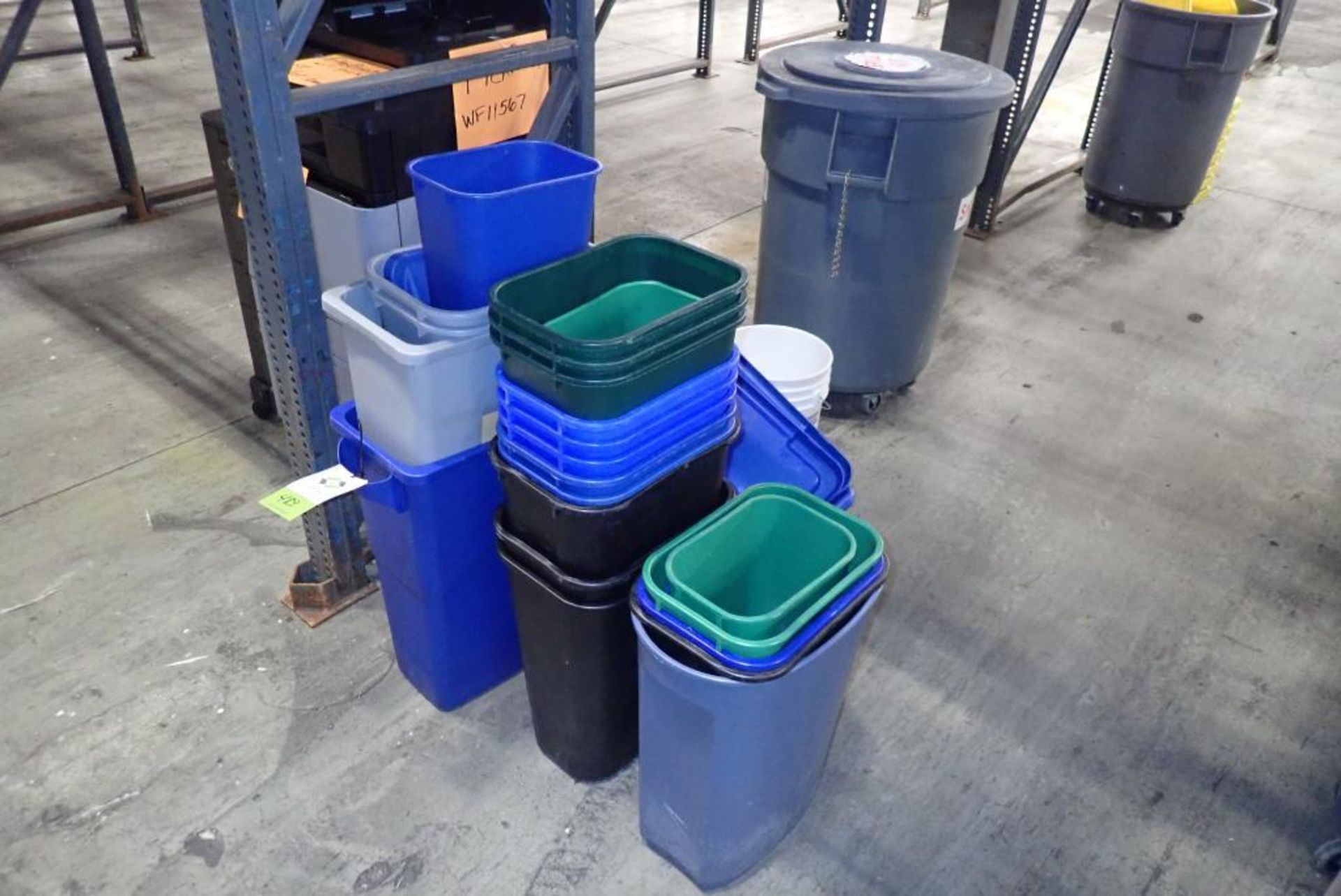 Lot of assorted trash and recycle bins