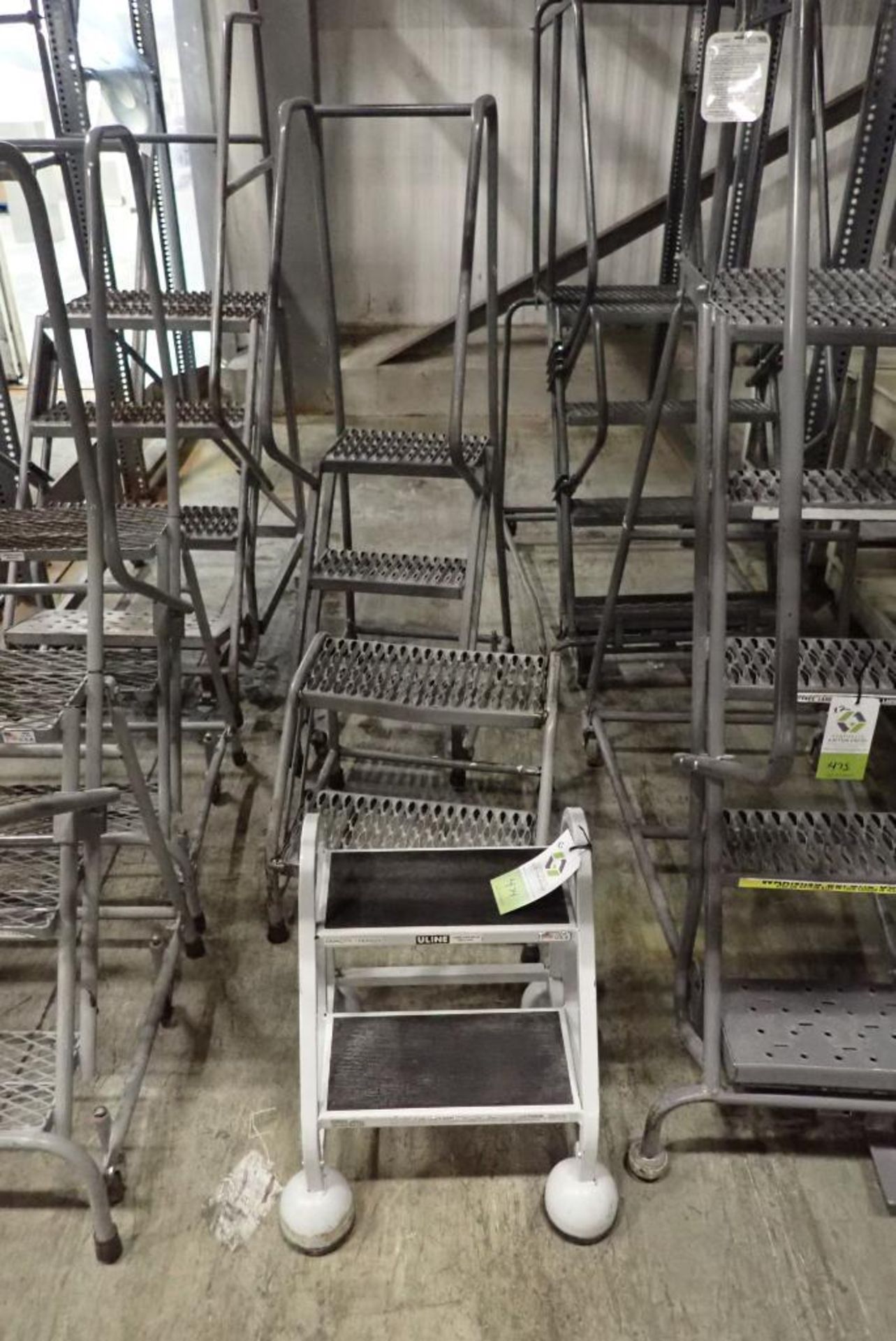 (3) assorted warehouse ladder and step stools