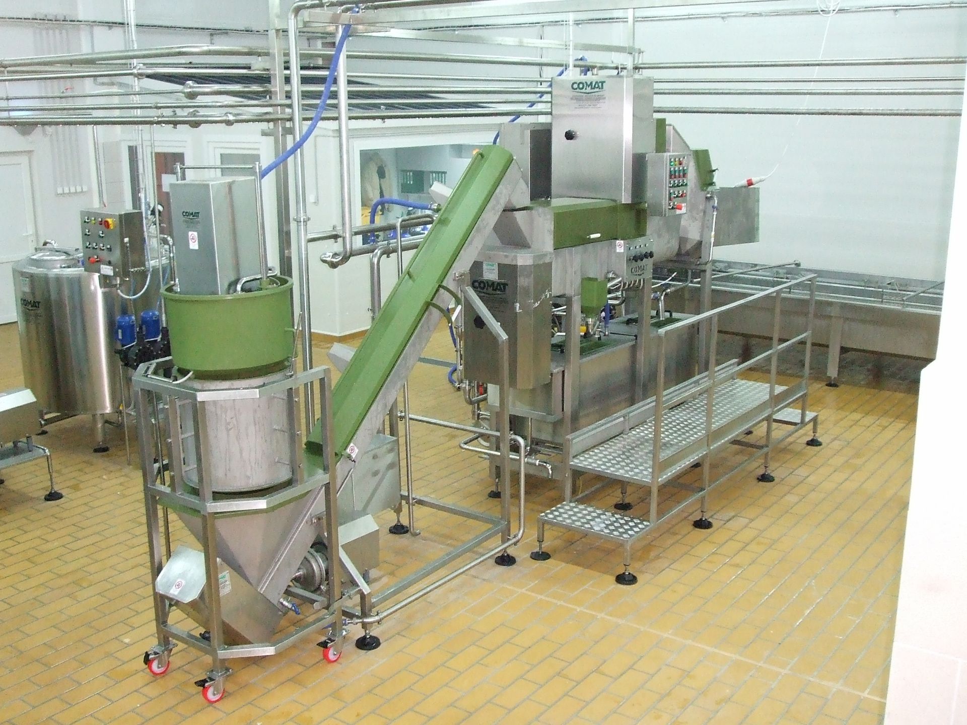 2X COMAT PROCESSING LINES FOR MOZZARELLA CHEESE TO PRODUCE MOZZARELLA STICKS AND MOZZARELLA BLOCKS.