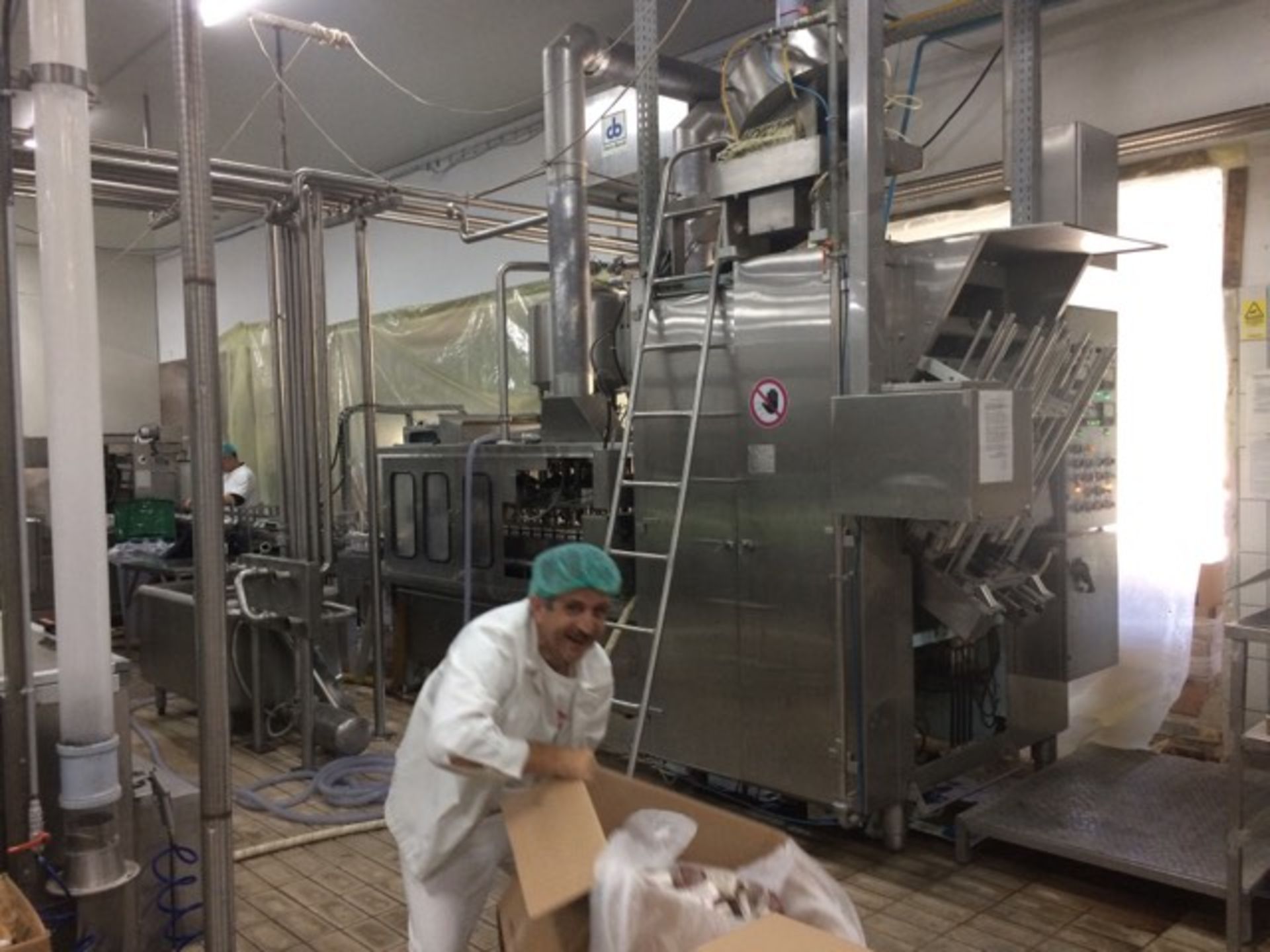 CHERRY BURRELL QL-11 - MILK BOTTLING MACHINE (GABLE TOP CARTONS, A-STYLE). LOCATION GREECE