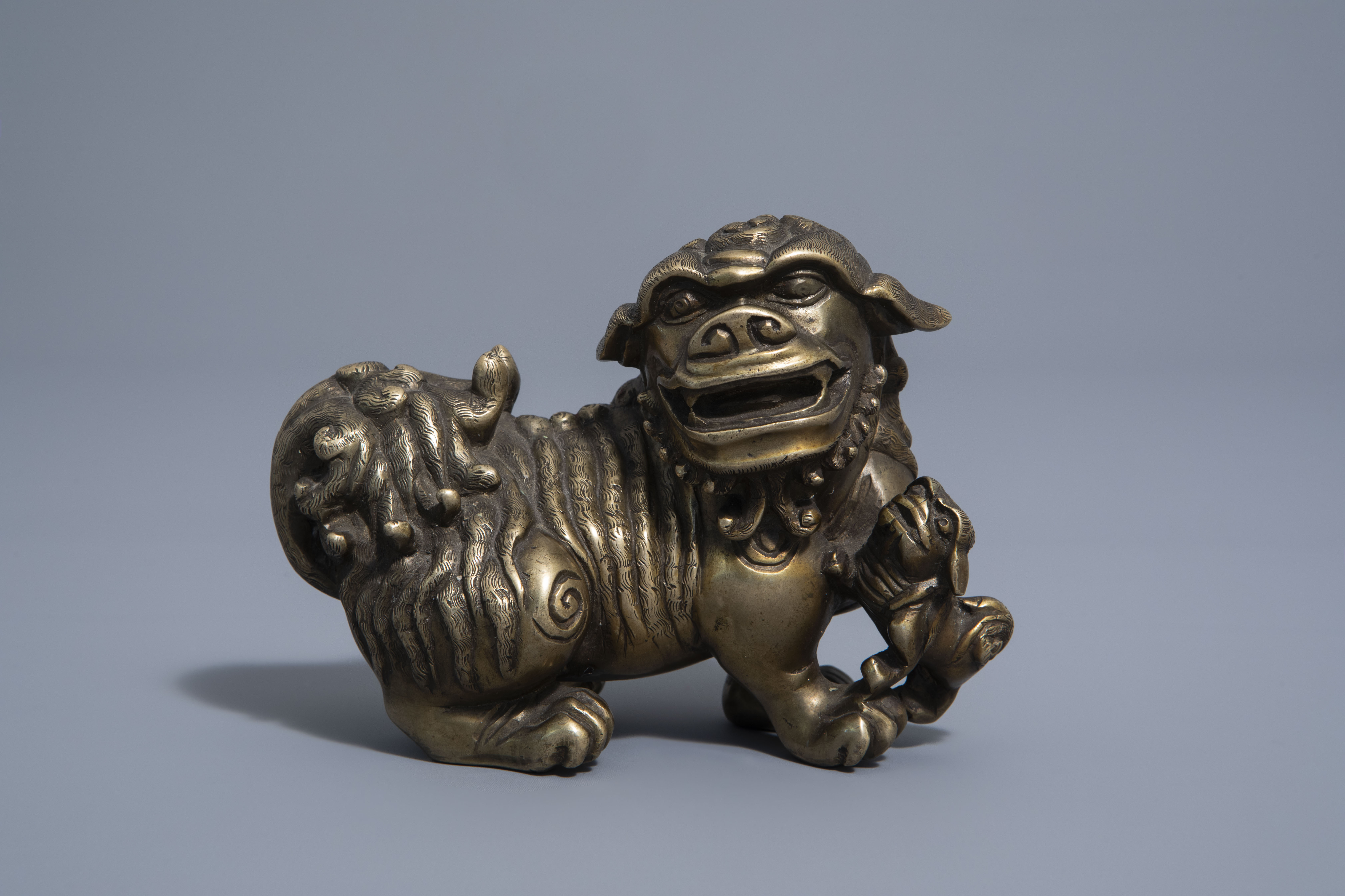 A Chinese bronze model of a Buddhist lion, late Qing - Image 2 of 7