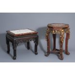 Two Chinese carved wood stands with marble tops, 20th C.