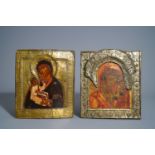 Two Russian 'Mother of God' icons with copper oklad or riza, 19th C.