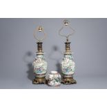 A pair of Chinese Canton famille rose vases mounted as lamps and a famille verte jar, 19th C.