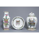 Two Chinese famille rose vases and a charger with incense burners and jardinires, 19th C.