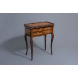 An elegant French gilt bronze mounted veneered wooden flip top play or card table, 19th C.