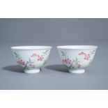 A pair of Chinese famille rose cups with floral design, Yongzheng mark, 19th/20th C.