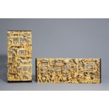 Two Chinese reticulated gilt wooden panels with Cultural Revolution scenes, 20th C.