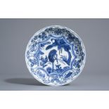 A Chinese blue and white dish with a deer in a landscape, Wanli