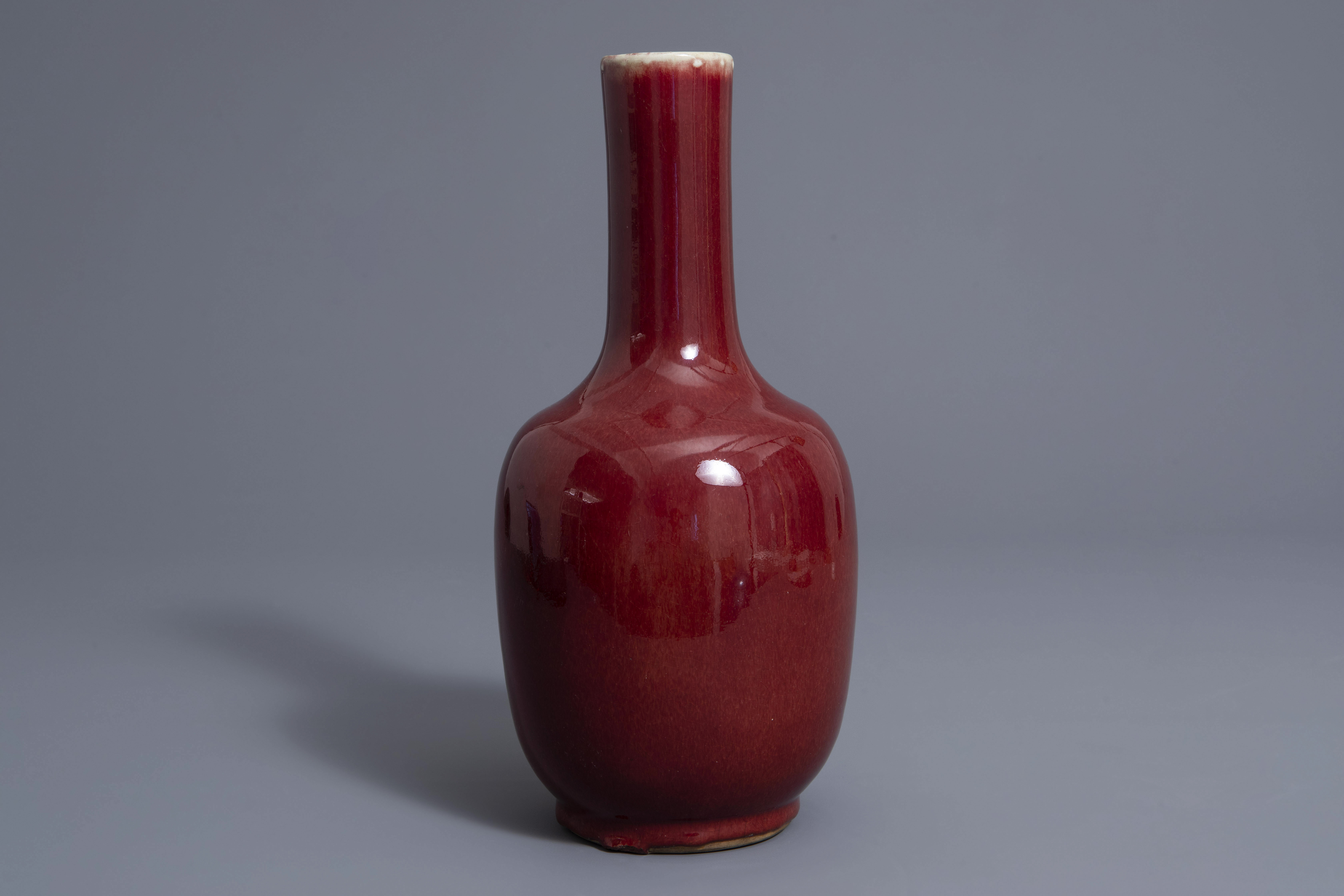 A Chinese sang de boeuf glazed bottle vase, Kangxi mark, 19th C. - Image 2 of 7