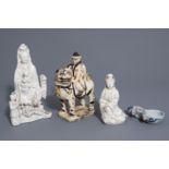 A Chinese blue, white & red brushwasher, a Cizhou figure & two blanc de Chine Guanyin, Ming & later