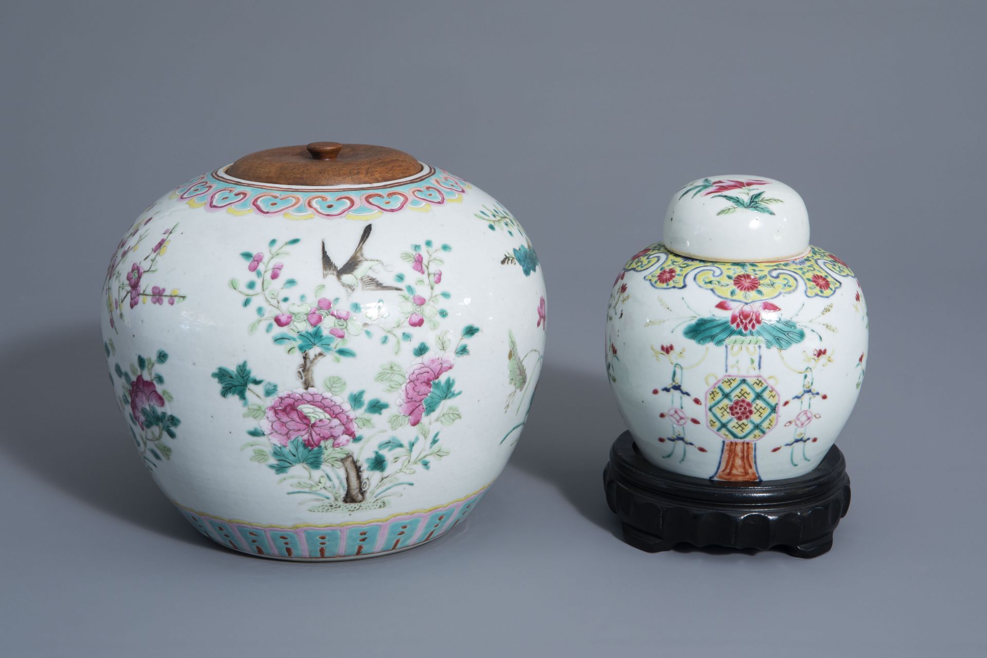 Two Chinese famille rose jars and covers with floral design, 19th and 20th C.