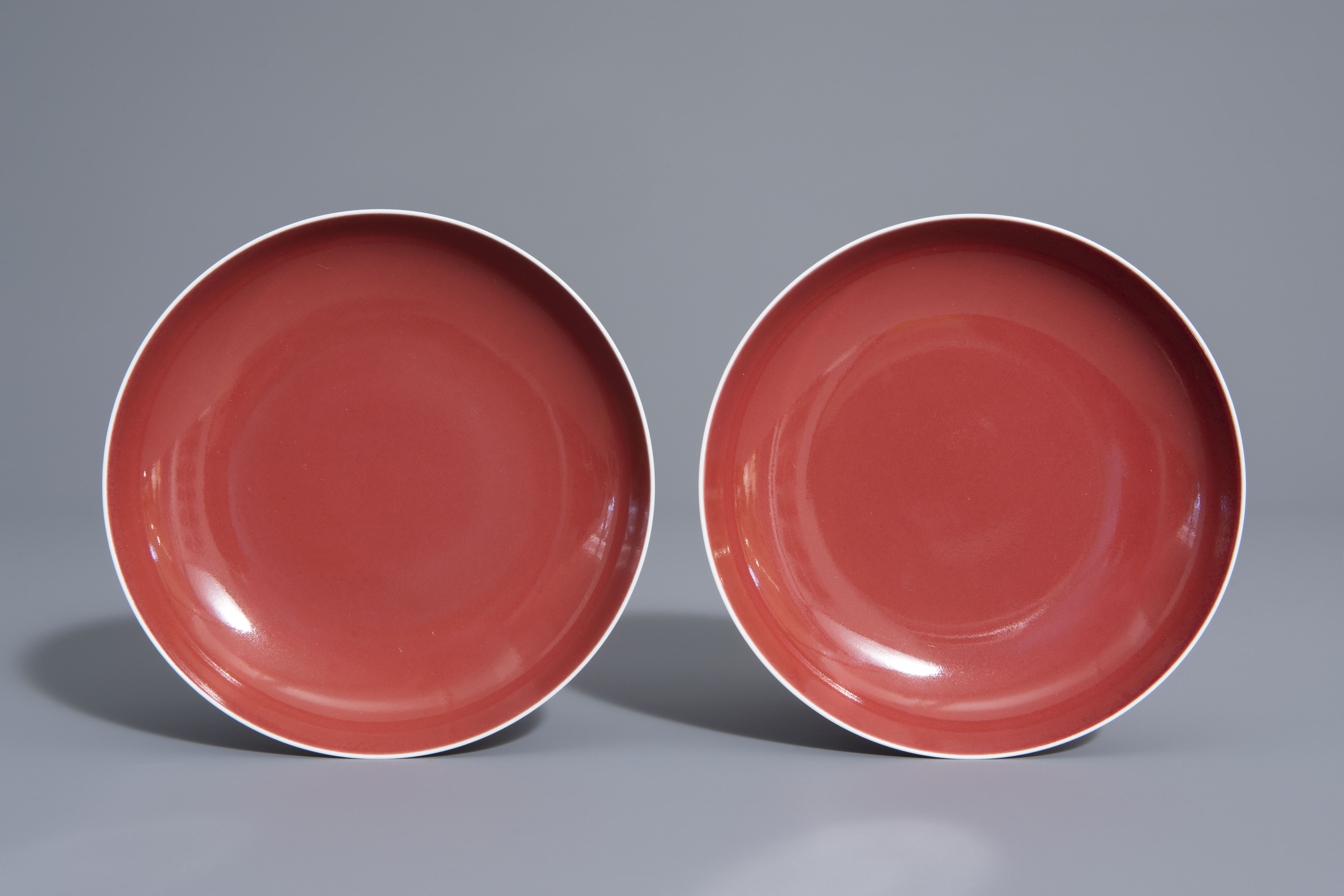 A pair of Chinese monochrome red plates, Qianlong mark, 19th/20th C.