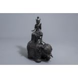 A large Japanese champlevŽ bronze group depicting Kannon on an elephant, Meiji, 19th C.