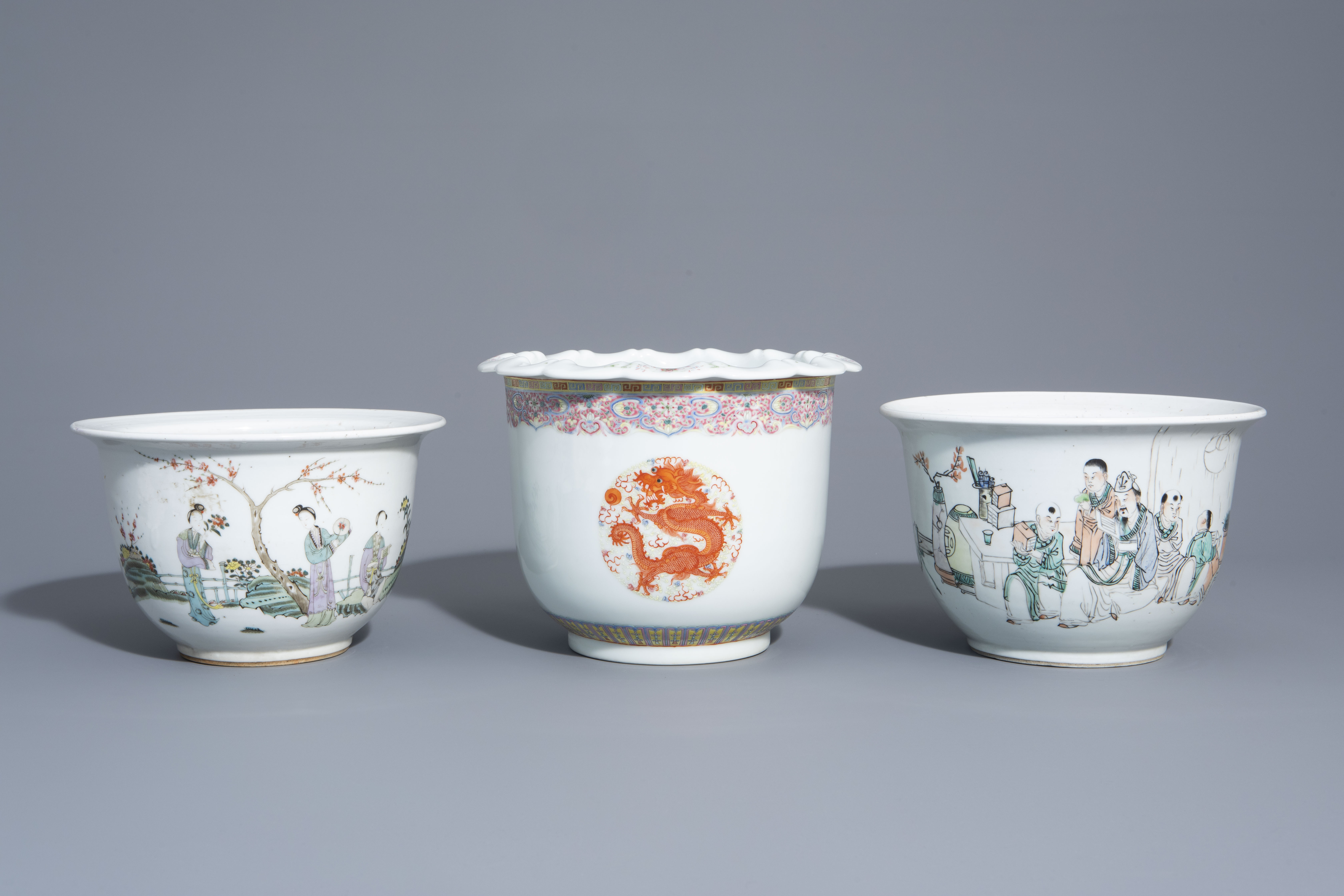 Three Chinese famille rose and qianjiang cai jardinires with different designs, 19th/20th C.