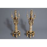An exceptional pair of large Chinese carved ivory and reticulated candlesticks, 19th C.