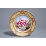 A Viennese polychrome and gilt plate with 'Die satyrische Poesie', signed JŠger, Austria, 19th C.