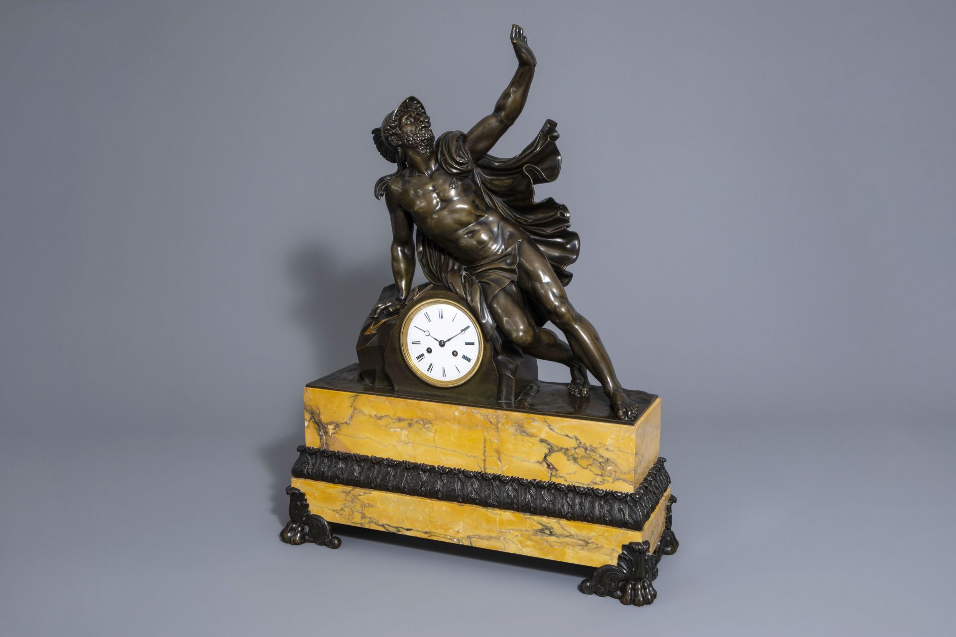 French mantel clock in patinated and gilt bronze and Siena marble, first half of the 19th C.