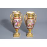 A pair of gilt & polychrome porcelain 'Empire' vases with floral design, Paris, France, about 1830