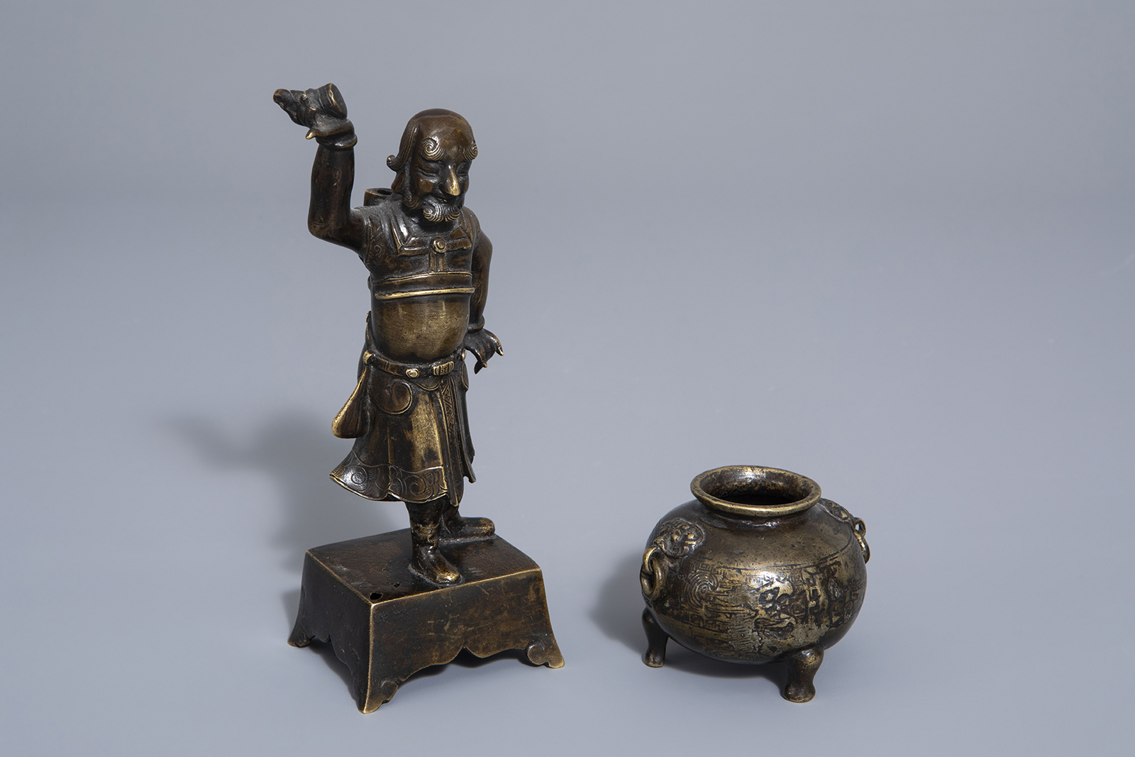 A Chinese bronze incense stick holder and a censer, Qing