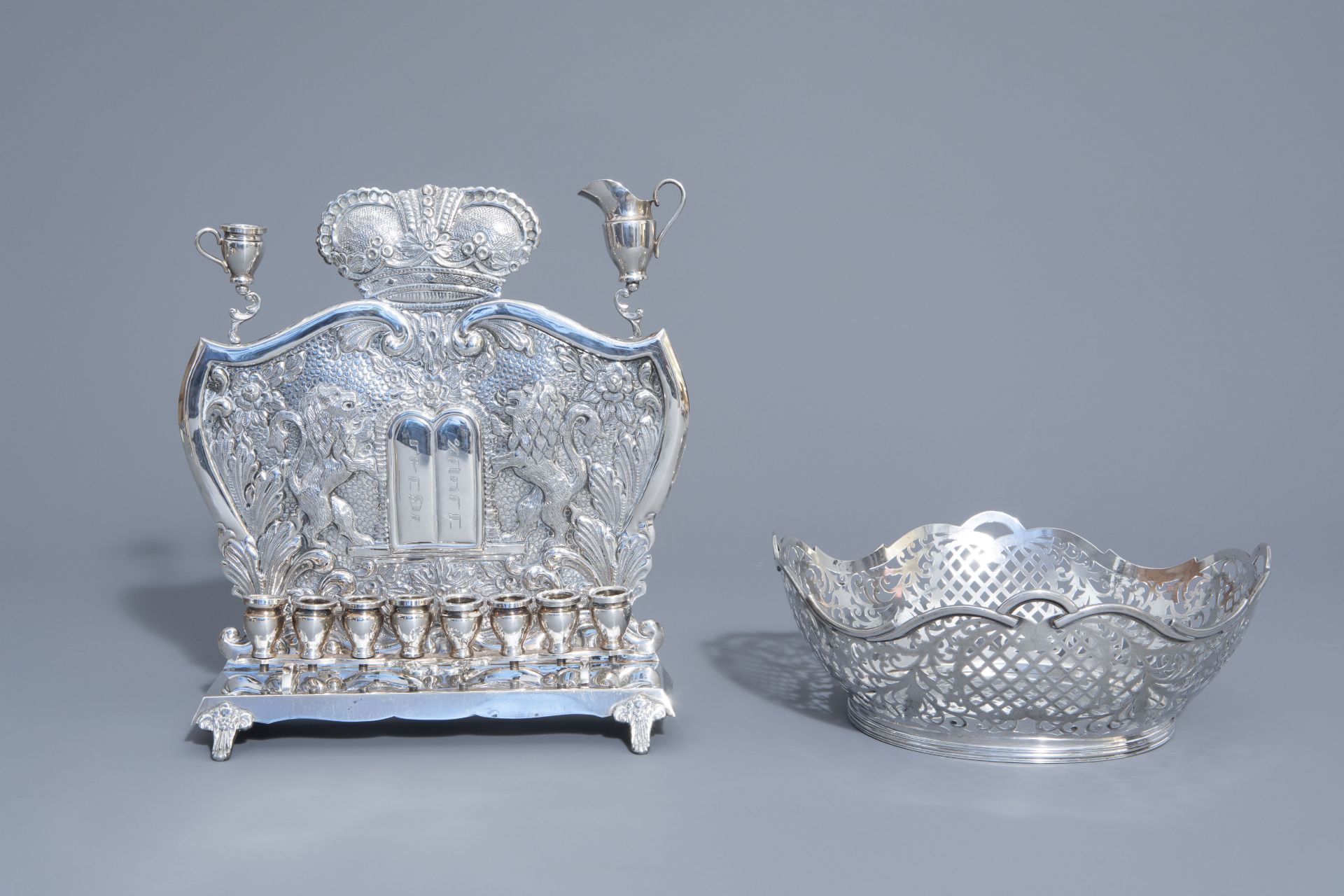 A Dutch silver open worked fruit bowl and a silver Hanukkah, 20th C.