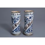 A pair of Catalan blue and white inscribed albarelli, Spain, 17th/18th C.