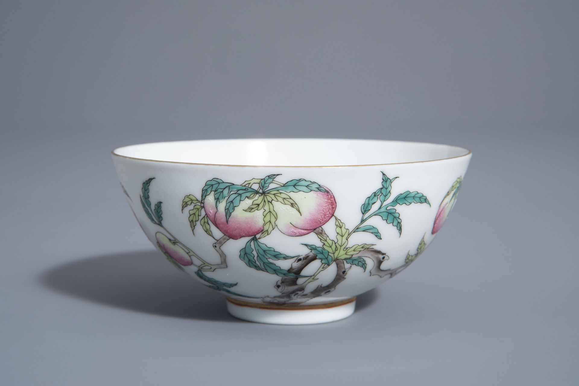A Chinese famille rose 'nine peaches and crane' bowl, Guangxu mark, 19th/20th C.